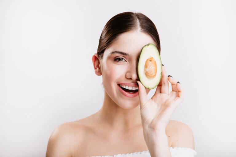 A Girl Using Avocado For Sking Whitening